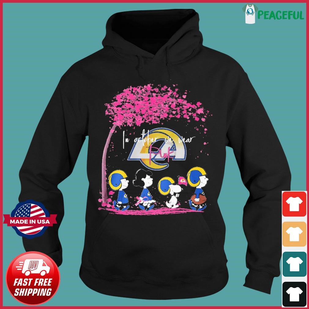 Official los angeles rams peanut characters in october we wear pink 2023  shirt, hoodie, sweater, long sleeve and tank top